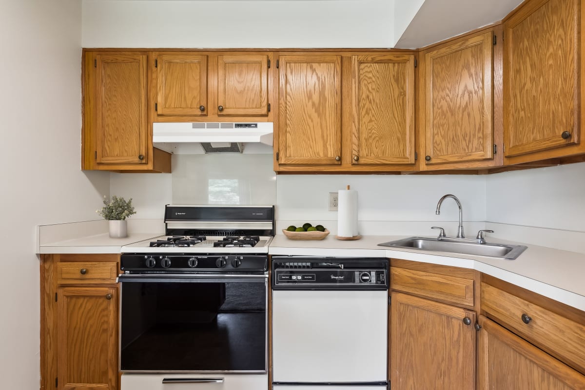 Model kitchen with oven, fridge, and dishwasher at Suburban Park in York, Pennsylvania