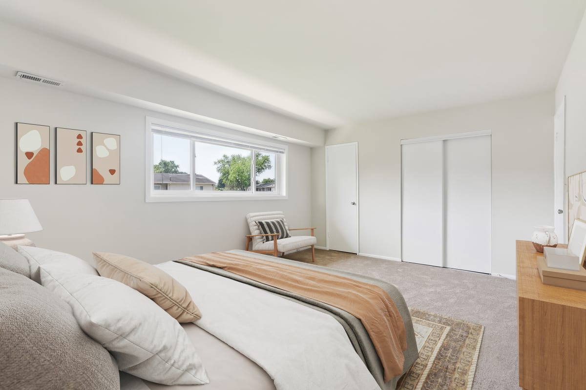 Model bedroom with closet space at Suburban Park in York, Pennsylvania