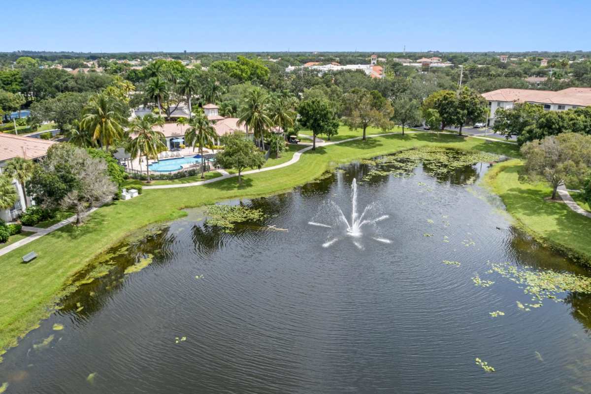 Lake of community aerial view at The Allara Apartments, Boynton Beach, Florida