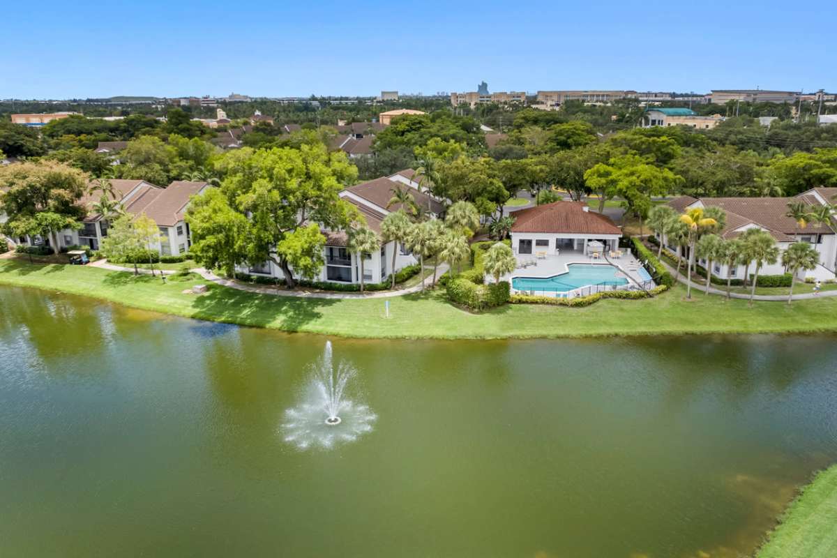 Beautiful lake by the property's side at Centro at Davie Apartments in Davie,Florida