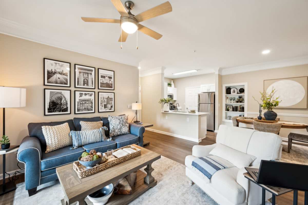 Living room with wood floors at Preserve at Legacy Park in Lawrenceville, Georgia