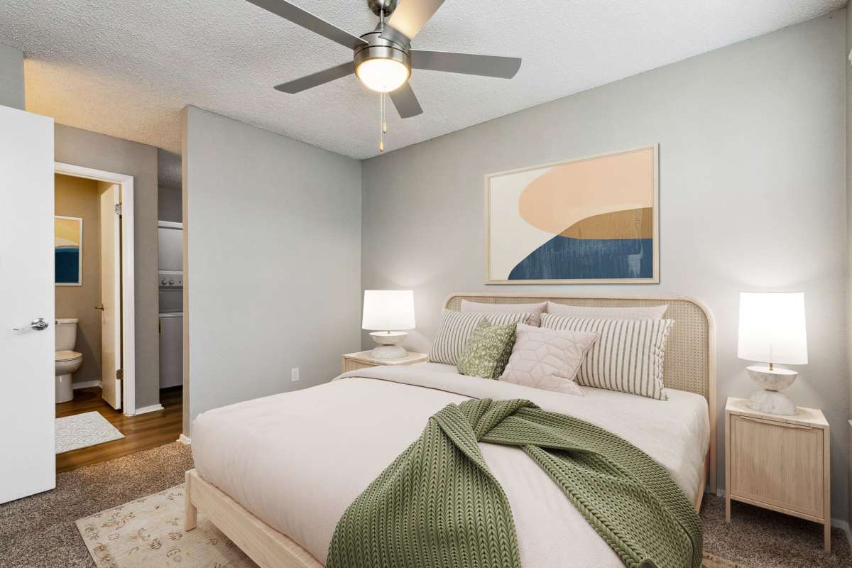 Model bedroom with en-suite bathroom at Hunters Glen in Killeen, Texas