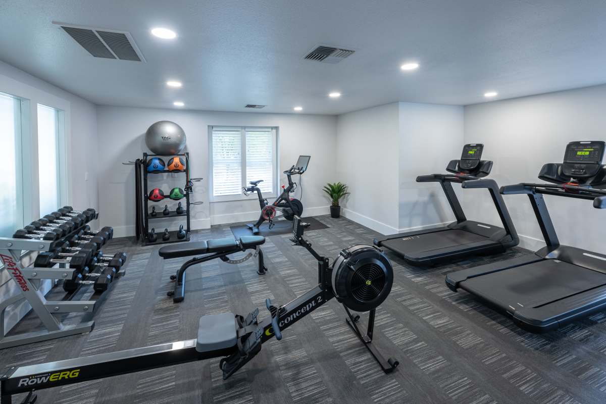 Well-equipped fitness center at Redmond Place Apartments in Redmond, Washington