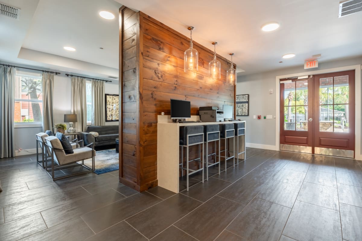clubhouse lounge area with computer desks
