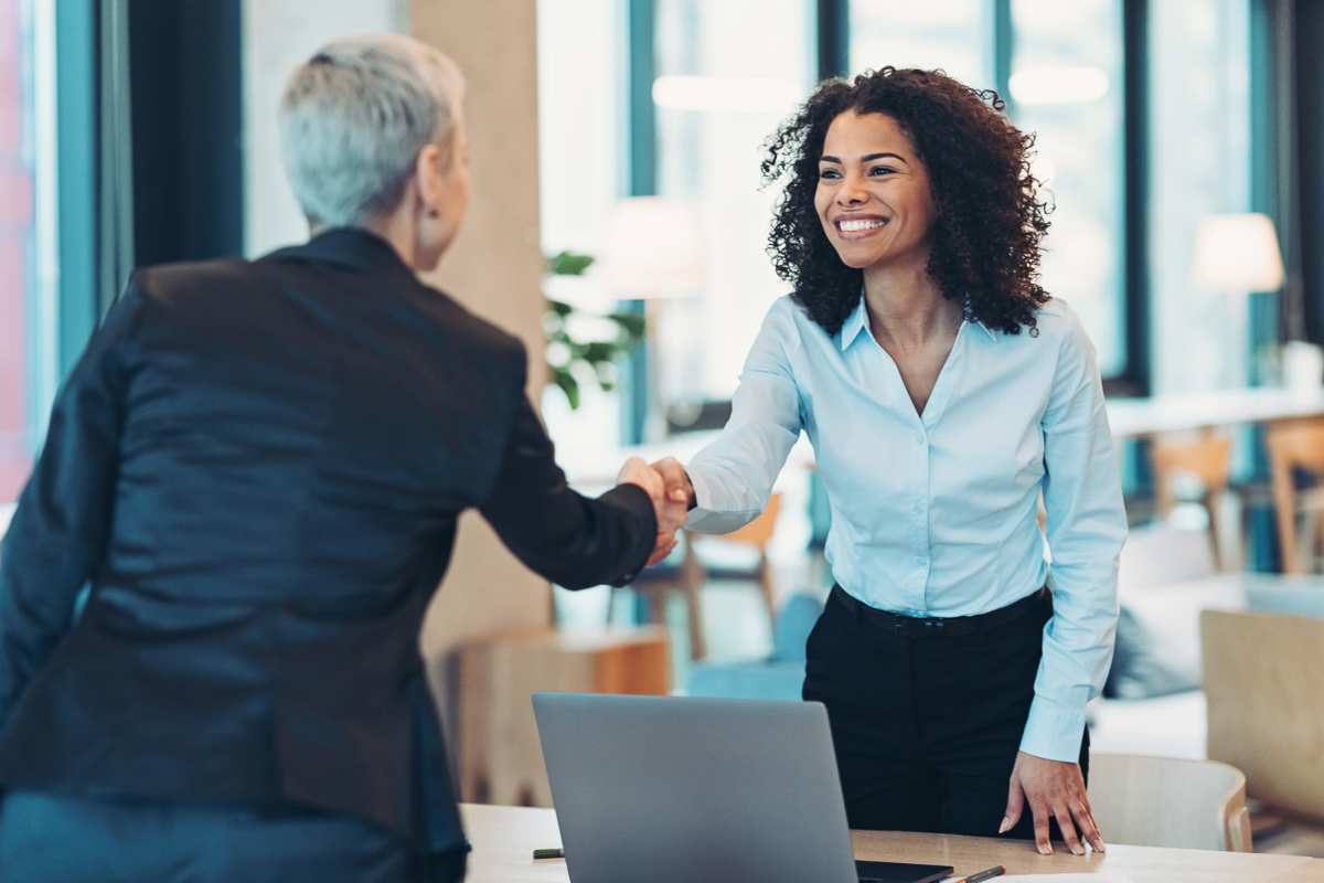 Two people shaking hands at Peters Residential in Culver City, California