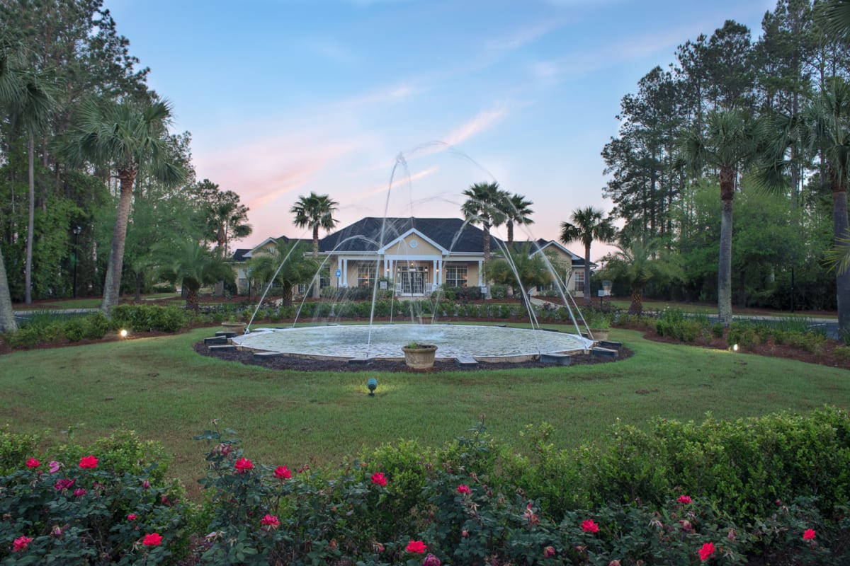 clubhouse exterior with a fountain