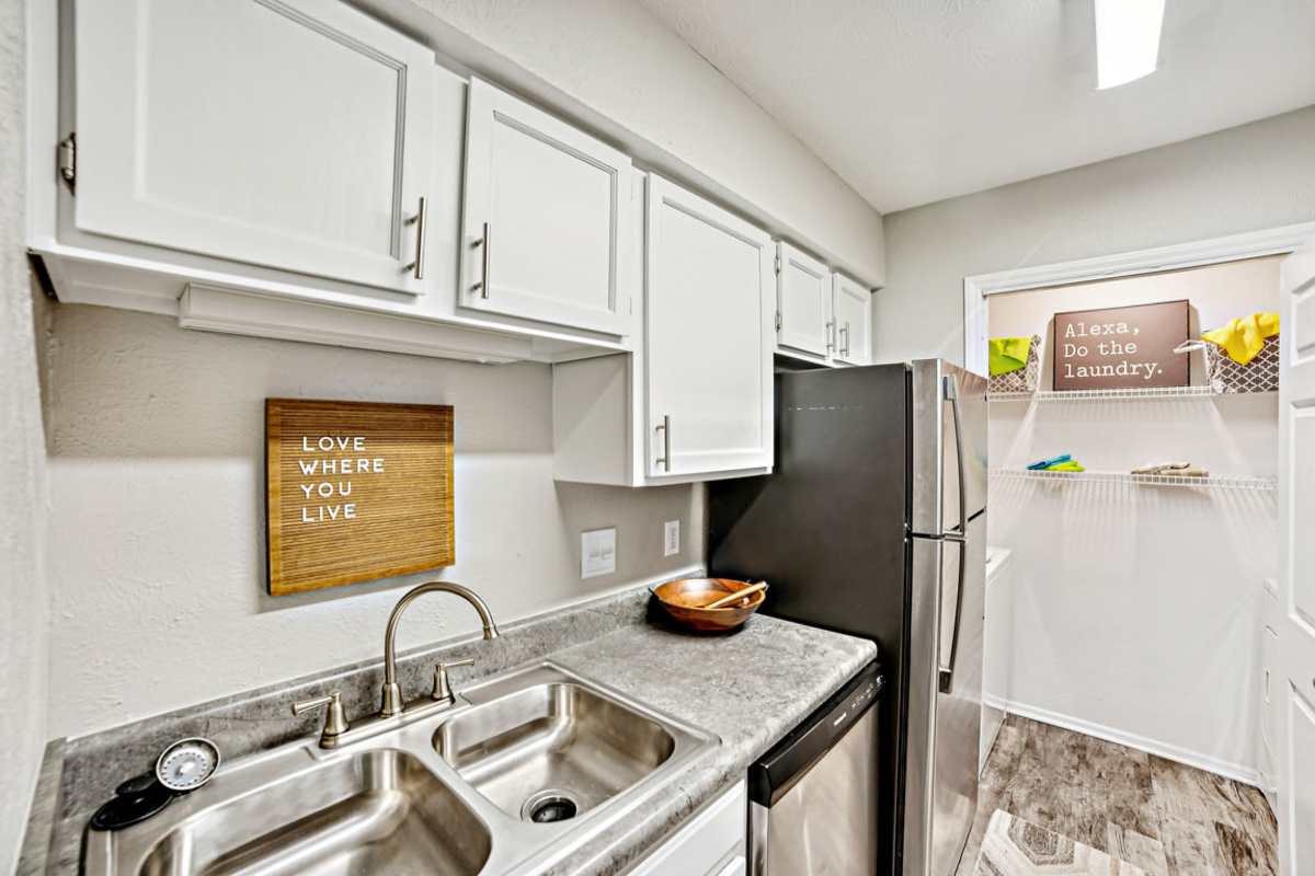 Modern kitchen with stainless appliances at Sherwood Acres in Baton Rouge, Louisiana
