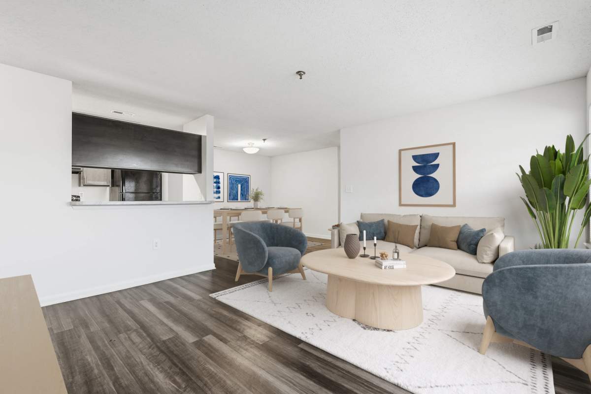 Living room with vinyl flooring at Lee Overlook Apartments in Centreville, Virginia