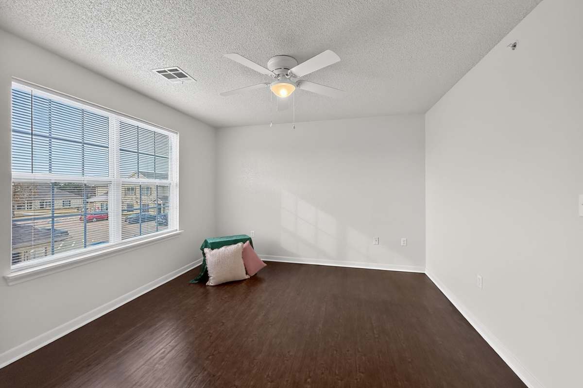 Bedroom with window at Riverstone Trails in Sunnyvale, Texas