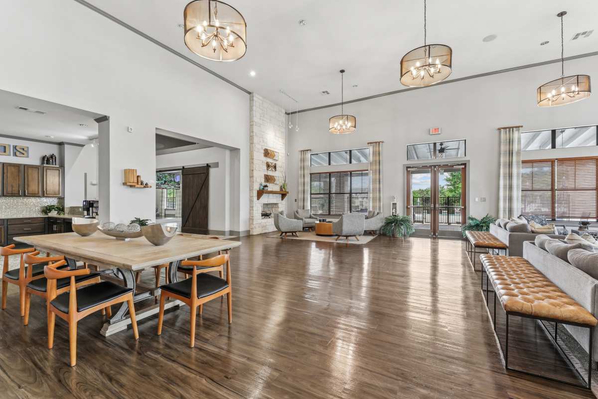 clubhouse with tables and chairs at Ethos Apartments, Austin, Texas