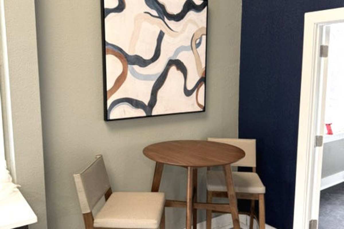Business center bistro table with four chairs at Hawks Pointe in Lawrence, Kansas