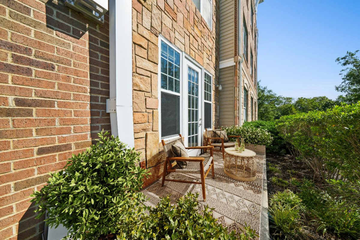 Outdoor patio space with coffee chairs and table