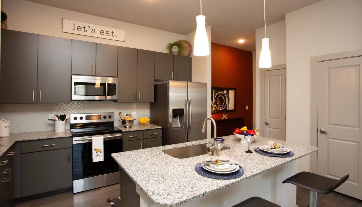 Model apartment dining room at MELA in San Antonio, Texas