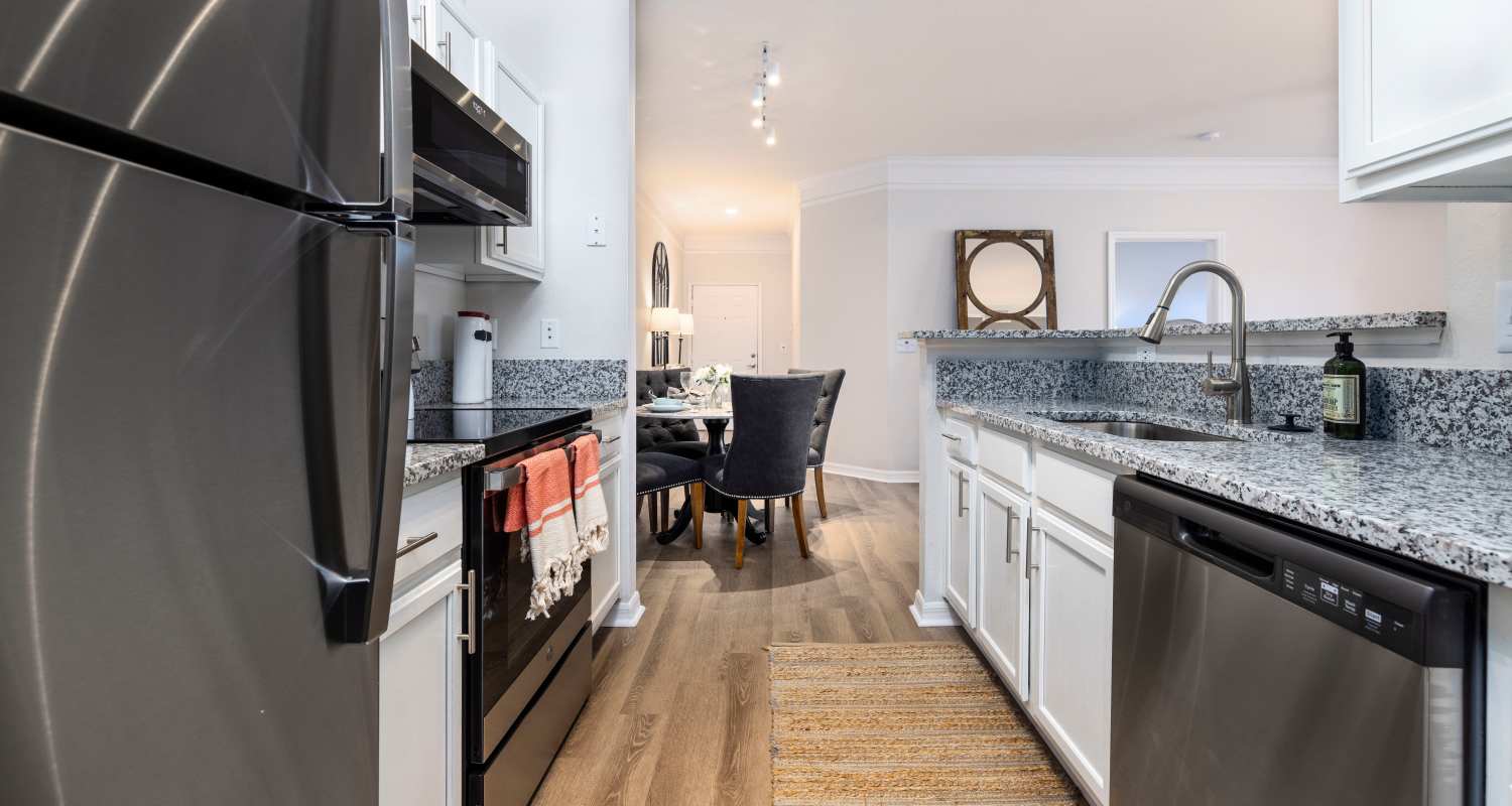 Stainless-steel appliances in an apartment kitchen at Arbors at Cahaba River in Birmingham, Alabama