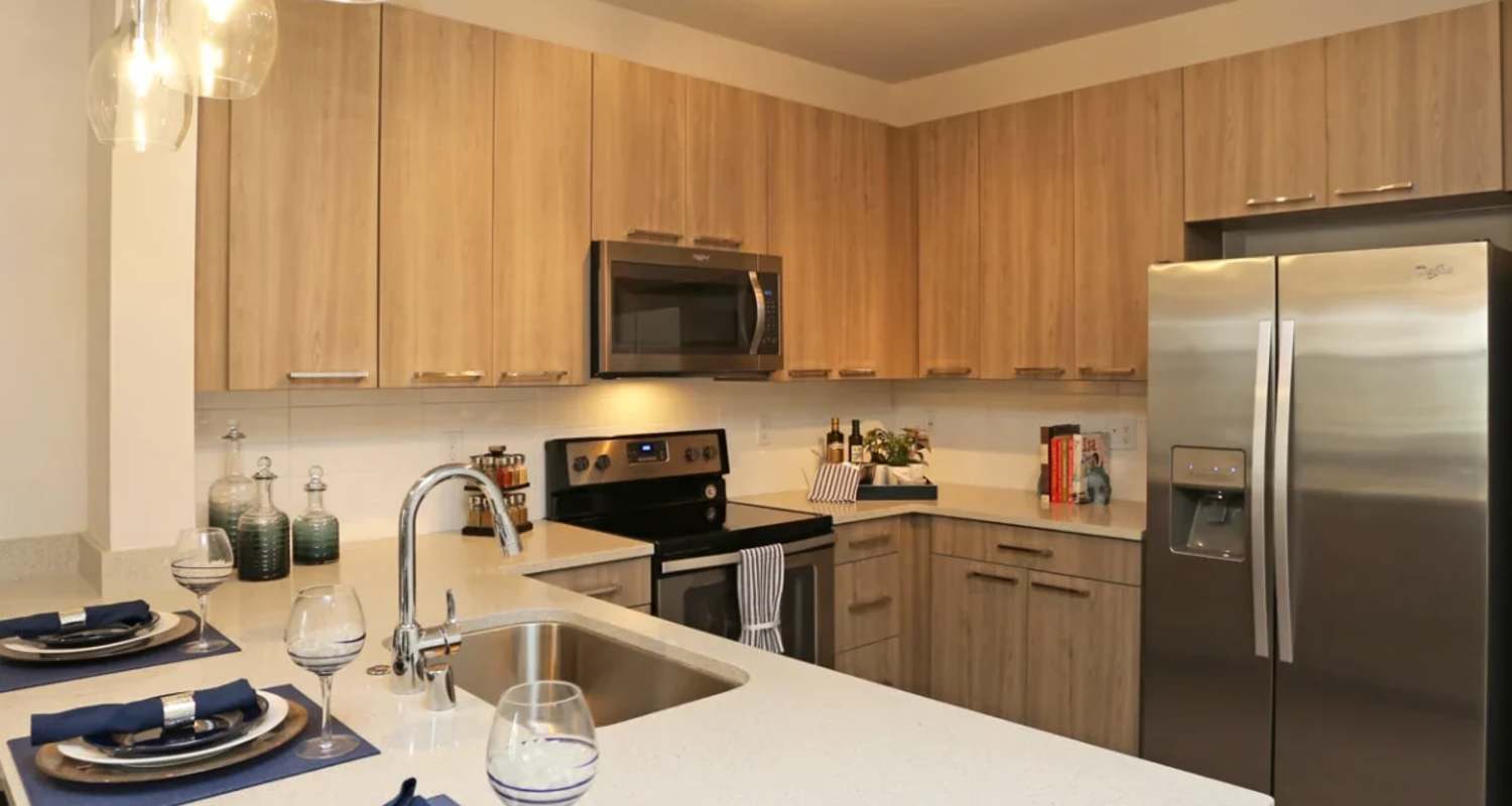Kitchen with stainless-steel appliances at Mayfair Reserve in Wauwatosa, WI