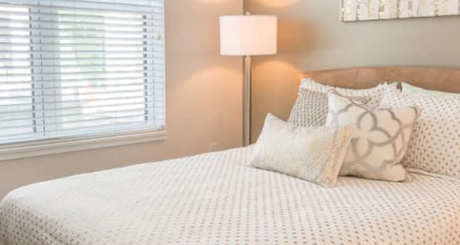 Cozy bedroom with lots of natural light at Mayfair Reserve in Wauwatosa, WI