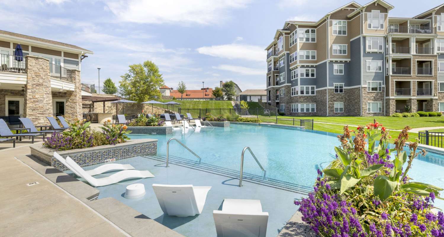 pool with flowers at The Residences at New Longview in Lee's Summit, MO