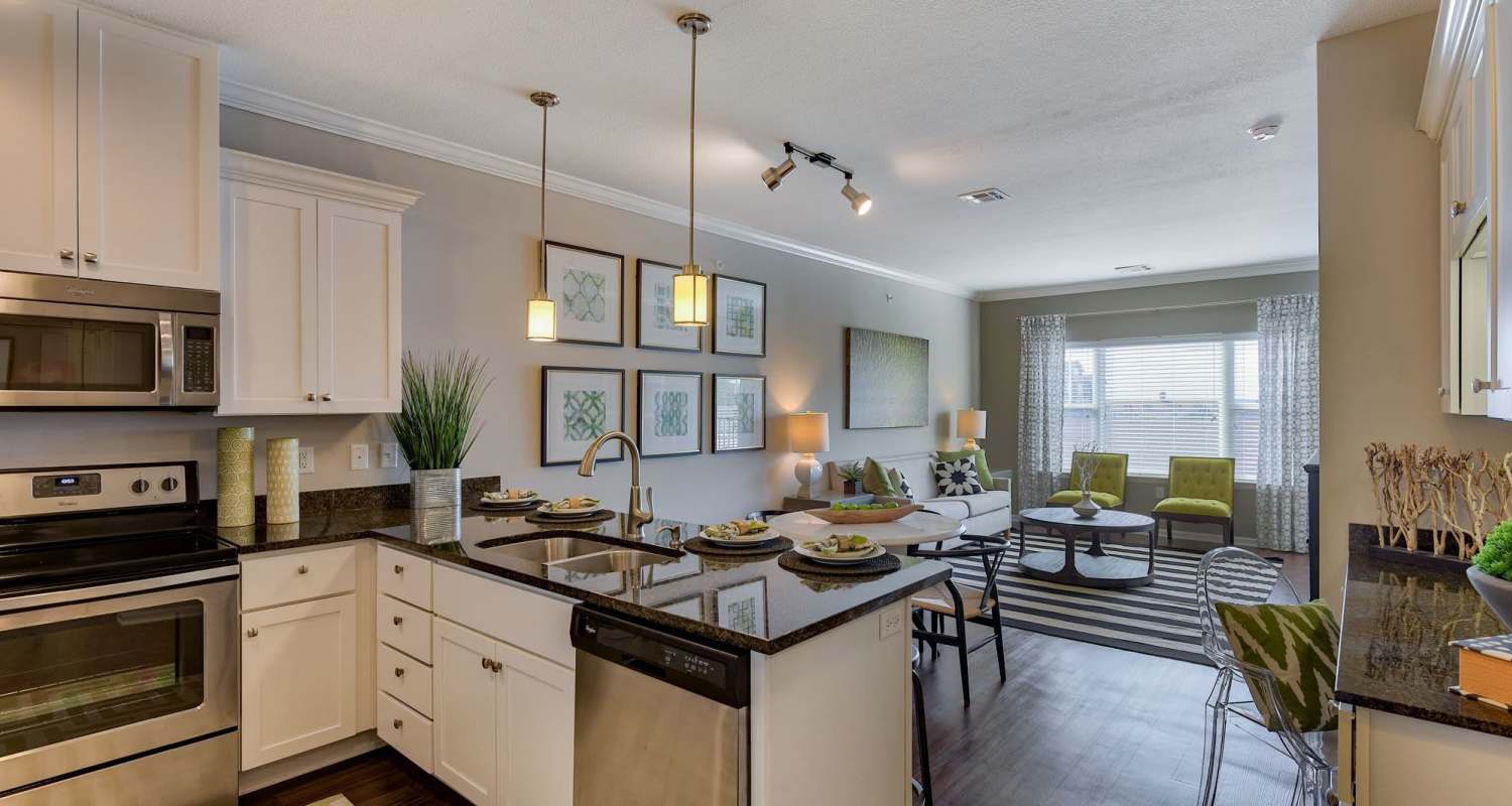 kitchen with white cabinets at The Residences at New Longview in Lee's Summit, MO