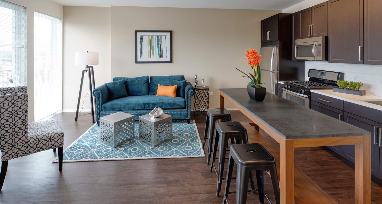 living area and kitchen at Courthouse Square Apartments in Wheaton, IL