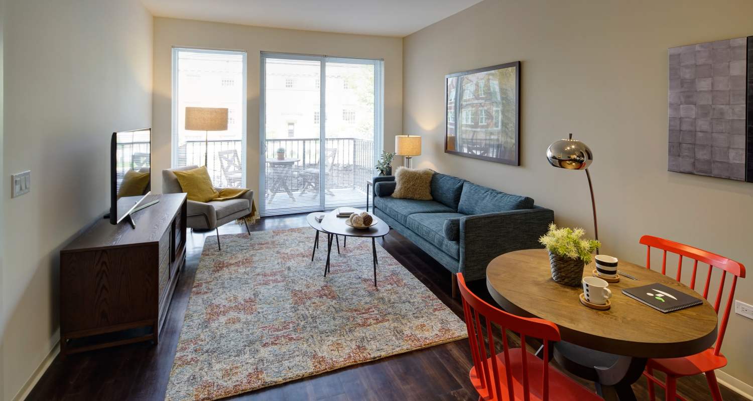 Cozy living room at Courthouse Square Apartments in Wheaton, IL