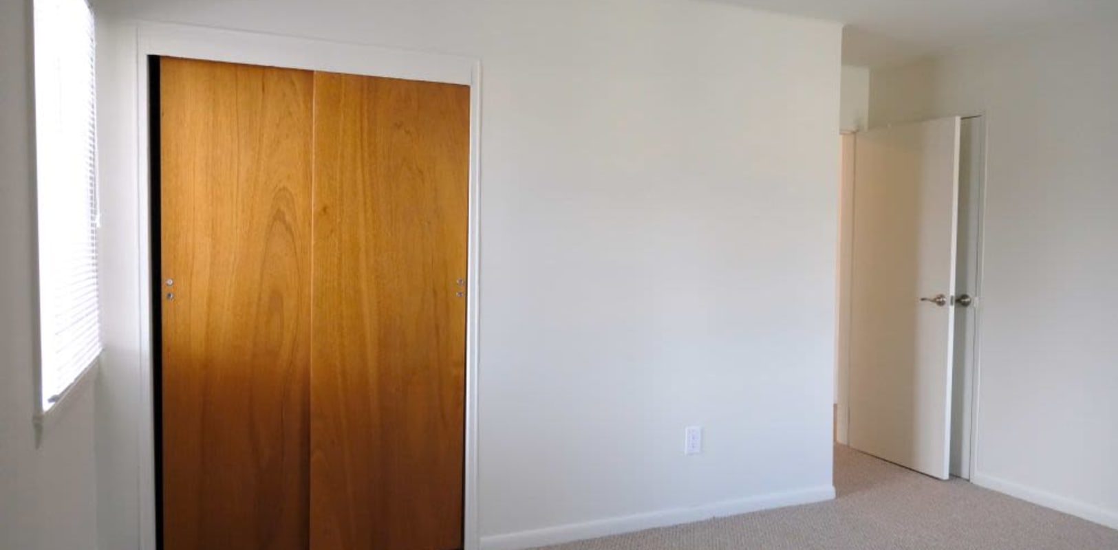 Bedroom with a large closet at Hillside Terrace Apartments in Newton, New Jersey