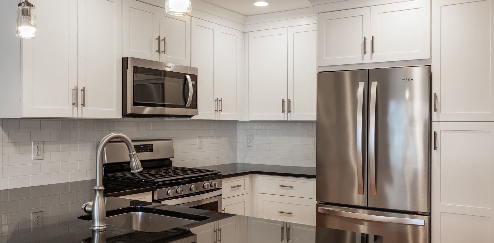 Modern looking kitchen with stainless steel appliances at Zephyr Ridge in Cedar Grove, New Jersey