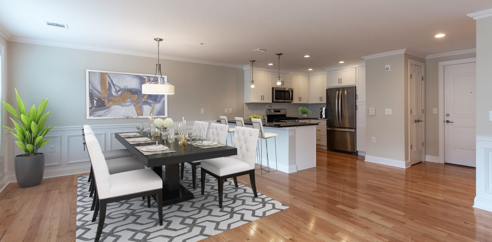 Kitchen and dining room with hardwood floors at Zephyr Ridge in Cedar Grove, New Jersey