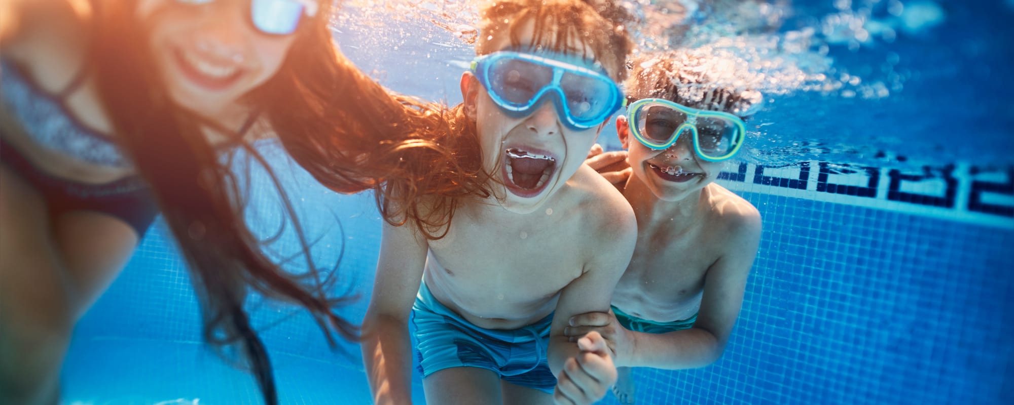 children swimming underwater at Sandpiper Crescent in Virginia Beach, Virginia