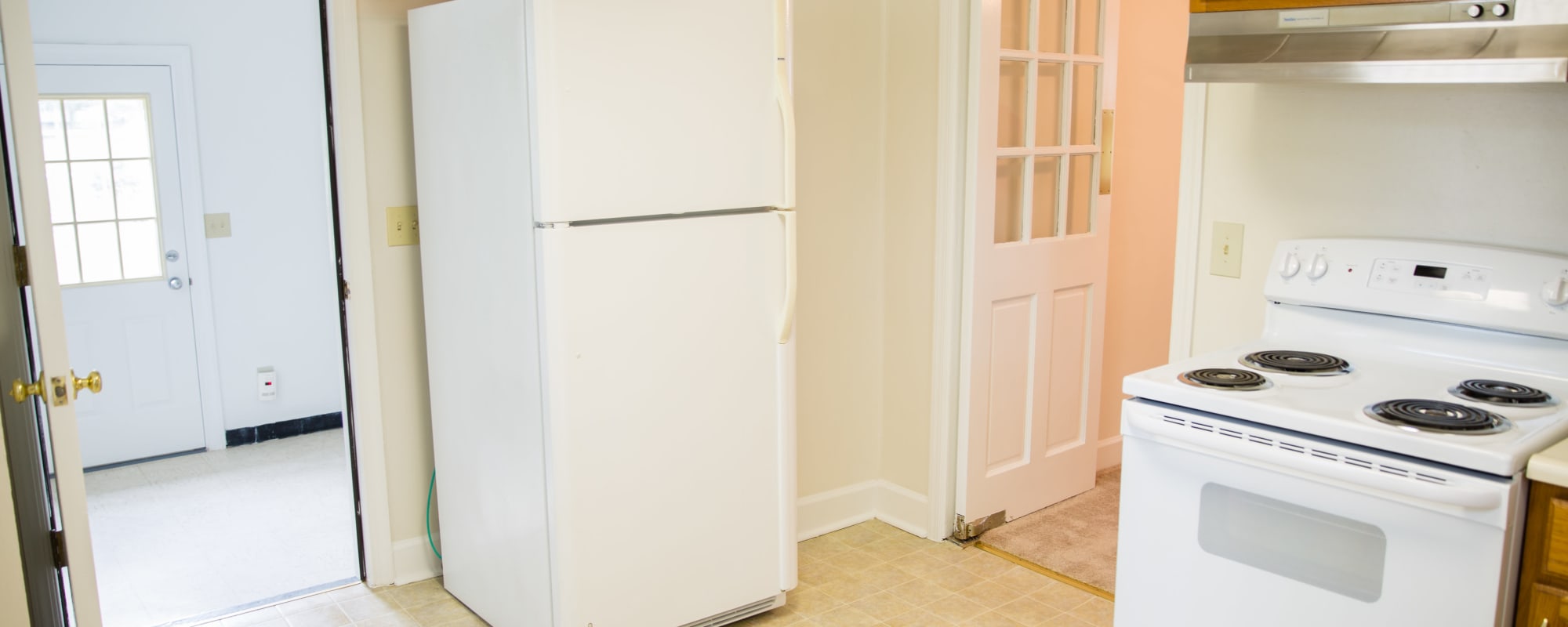 kitchen with appliances at Dahlgren Bungalows in Dahlgren, Virginia