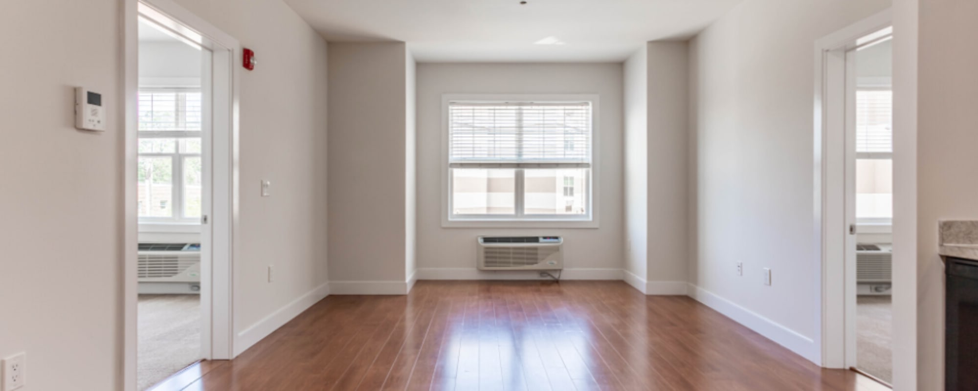 Wood flooring in an apartment living room at Grand Meridia Apartments in Rahway, New Jersey