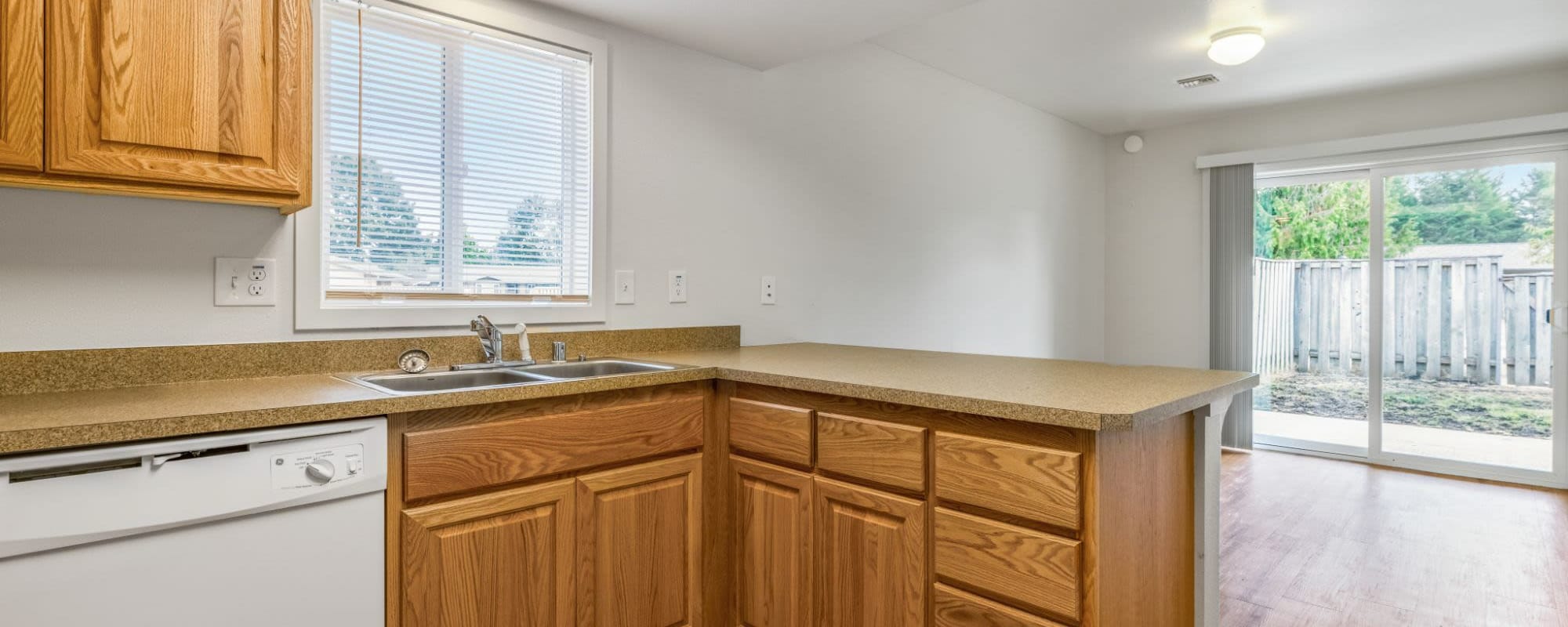 Open concept kitchen and dining at Evergreen in Joint Base Lewis McChord, Washington