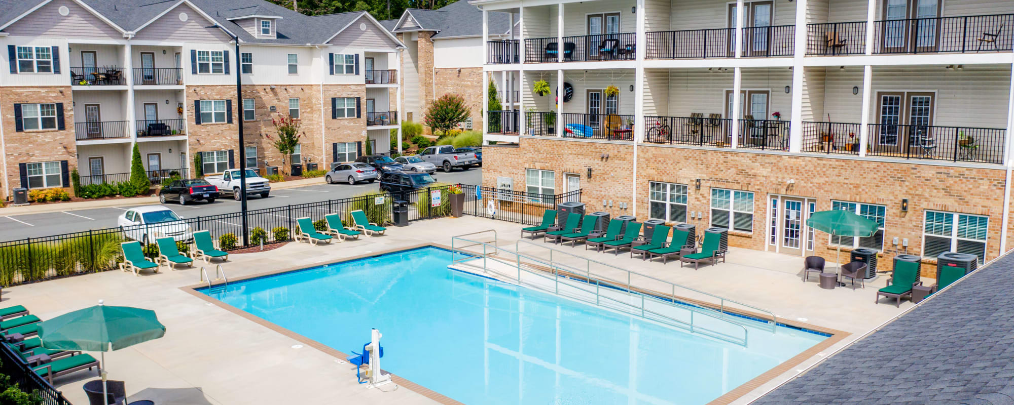 A sparkling community swimming pool at Retreat at the Park in Burlington, North Carolina