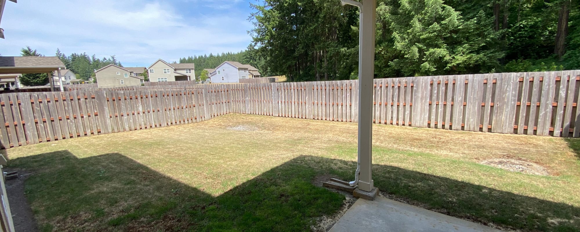 Fenced-in backyard at Cascade Village in Joint Base Lewis McChord, Washington