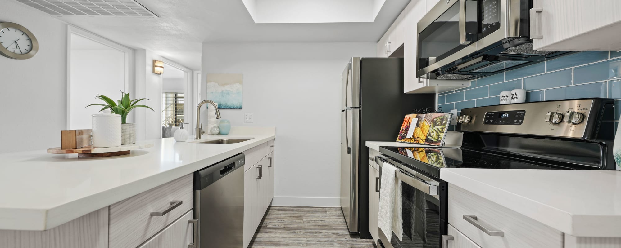 Stainless-steel appliances in a modern kitchen at Park at 33rd in Phoenix, Arizona