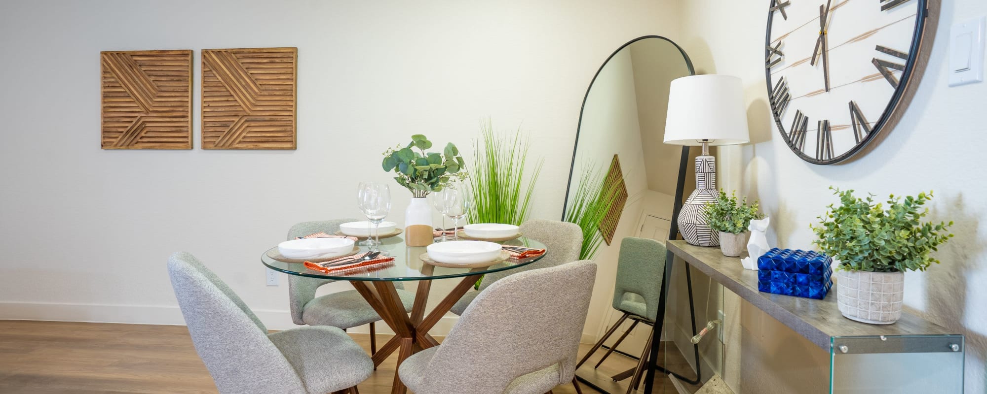 Dining table and mirror at Riverside Apartments in Tempe, Arizona