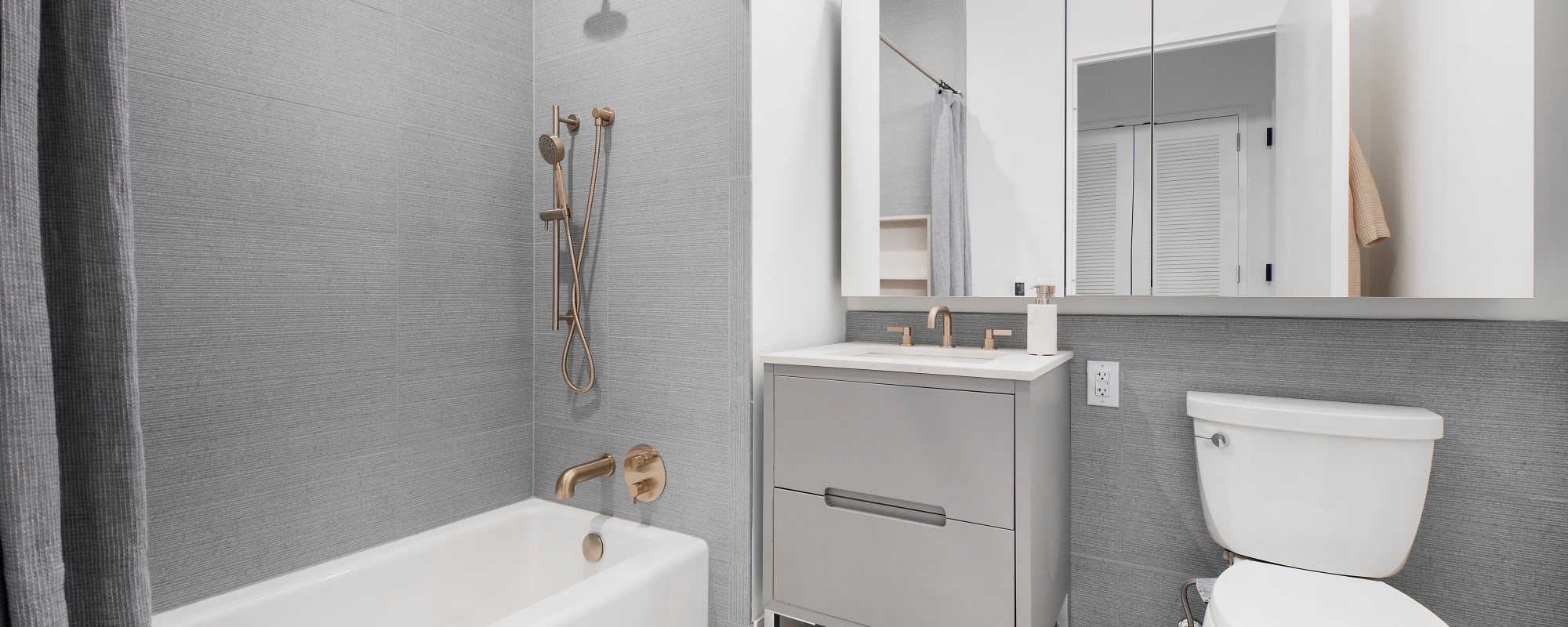 Rendering bathroom on apartment model at 8 Court Square in Long Island City, New York