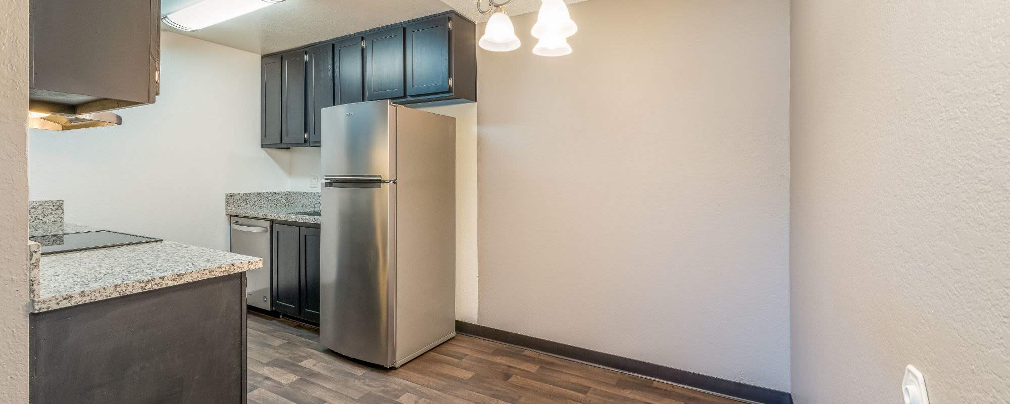 Kitchen with cabinets at Rosewood Park Apartments in Reno, Nevada