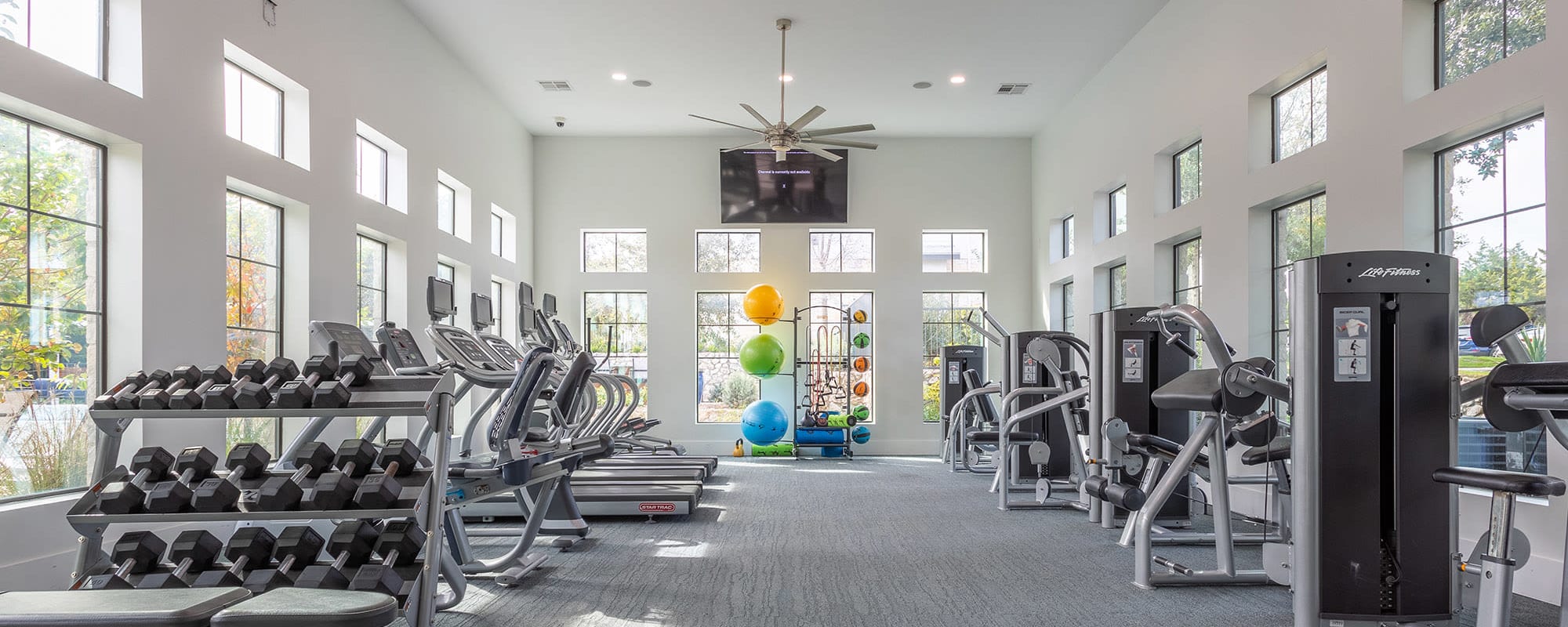 Fitness center at  Estates at Bee Cave in Bee Cave, TexasClean 