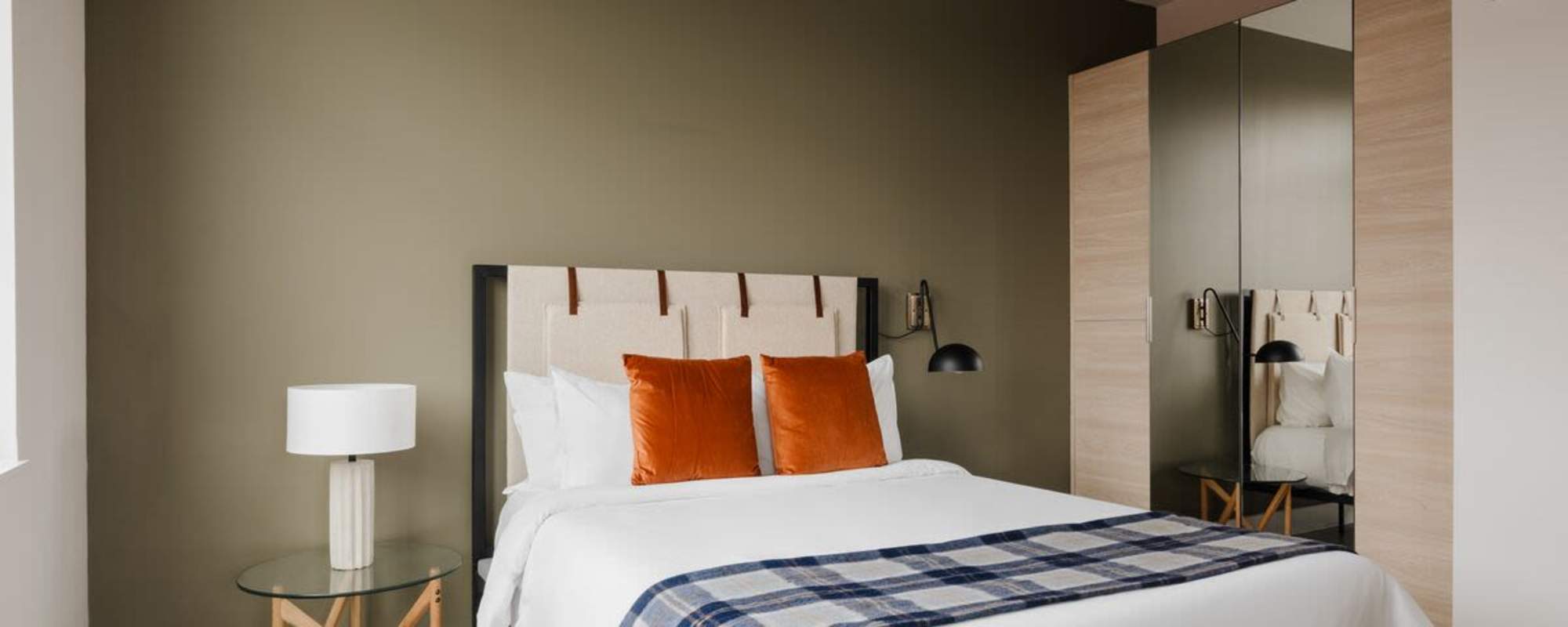 Bedroom with cozy bed at 313 RACE in Philadelphia, Pennsylvania