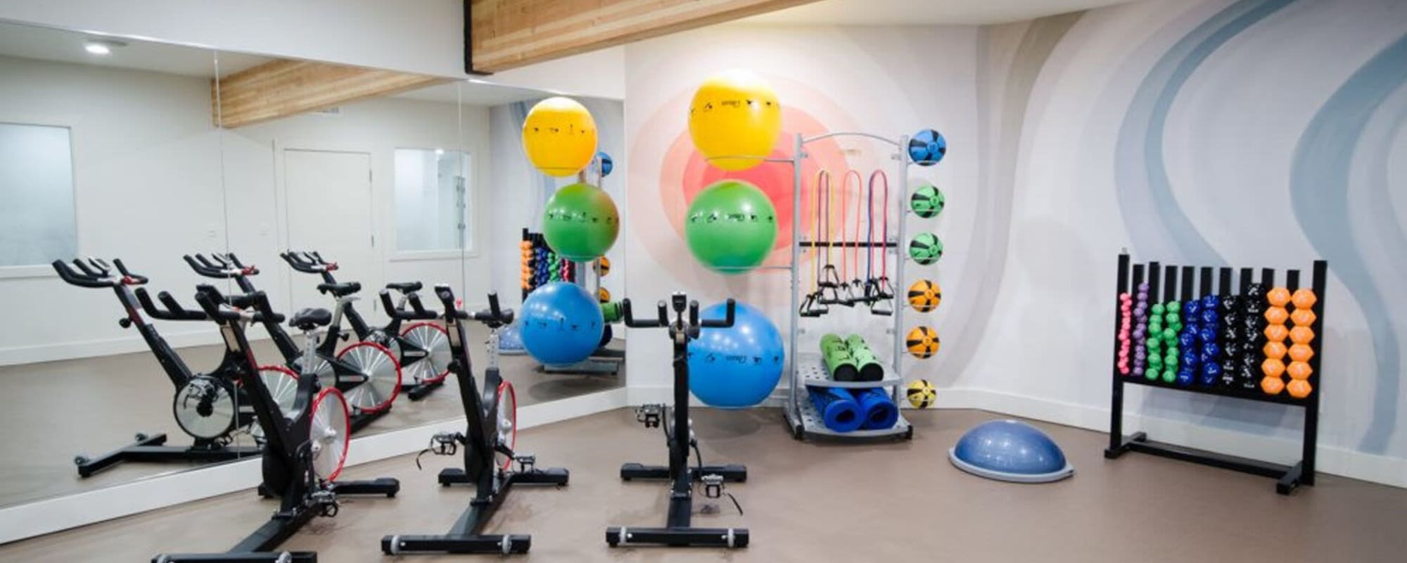 Fitness center with spin bikes at The Fairways in Tacoma, Washington