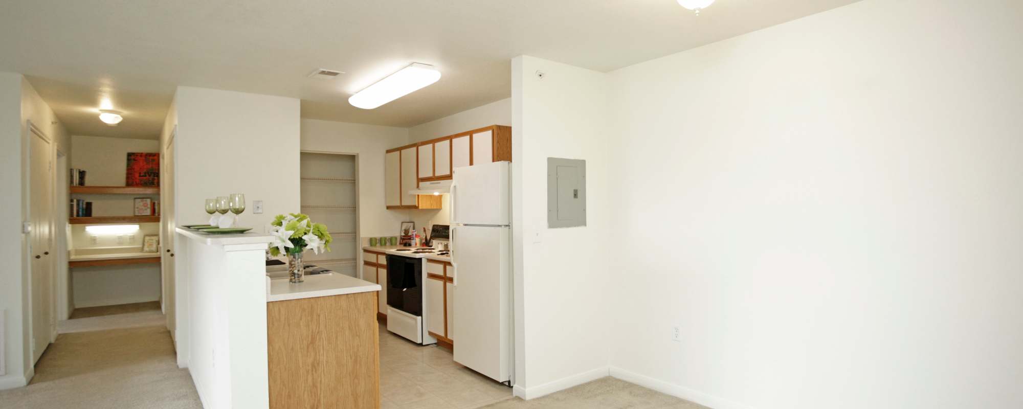Highrise countertop and white appliances at North Oak Crossing in Kansas City, Missouri