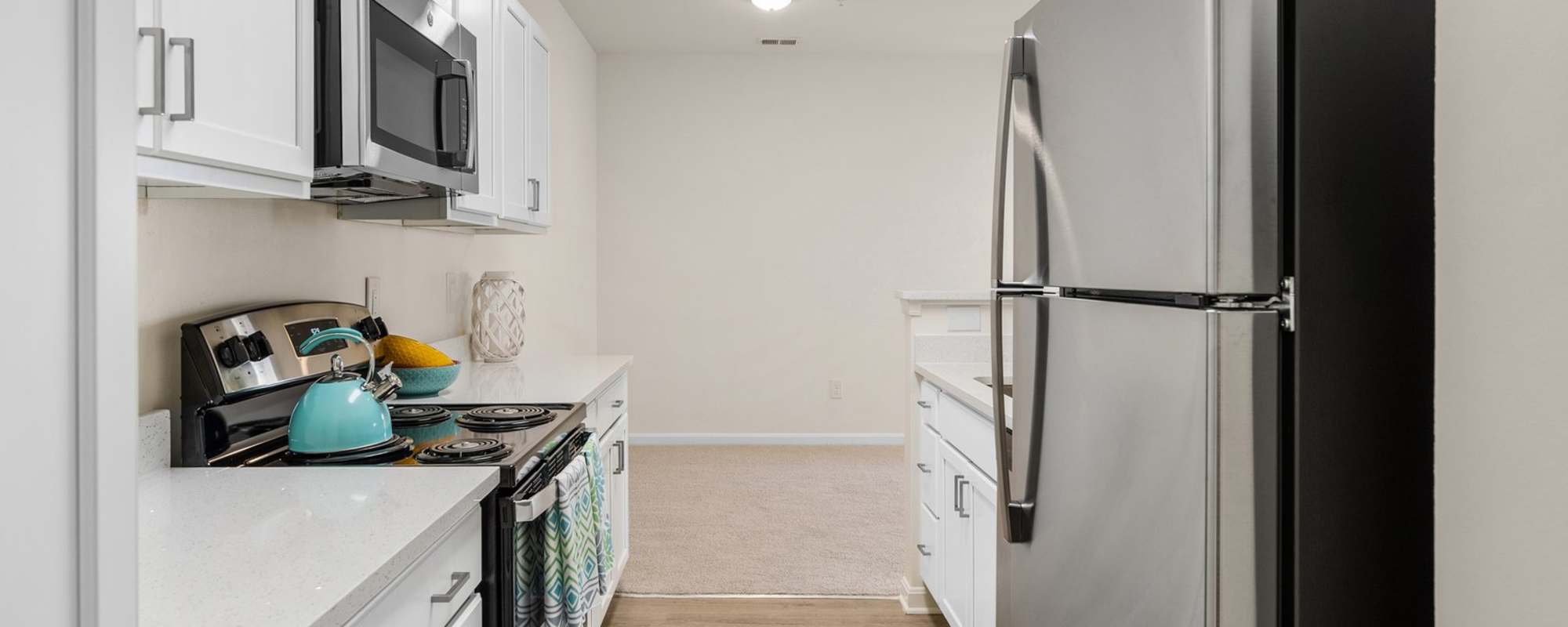 Kitchen with stainless-steel appliances at Marley Manor in Salisbury, Maryland