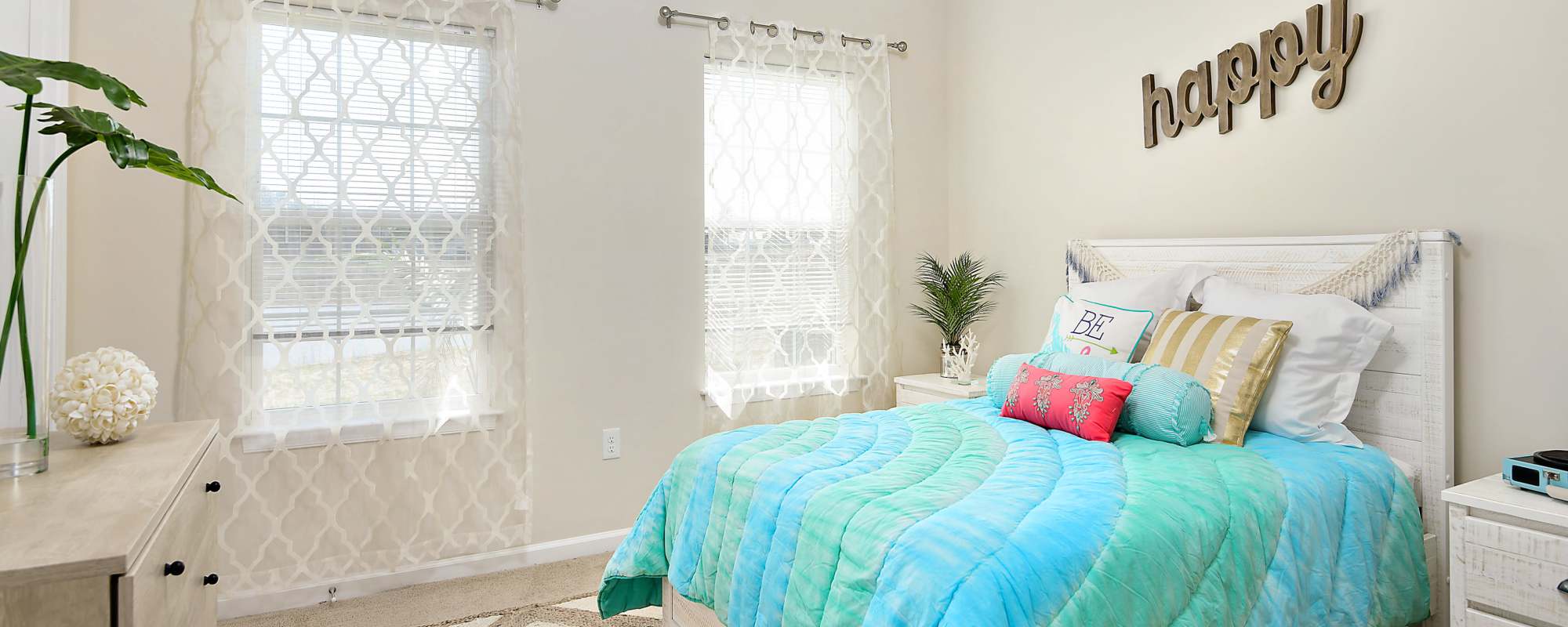 Bedroom with plush carpeting at Oceans East in Berlin, Maryland
