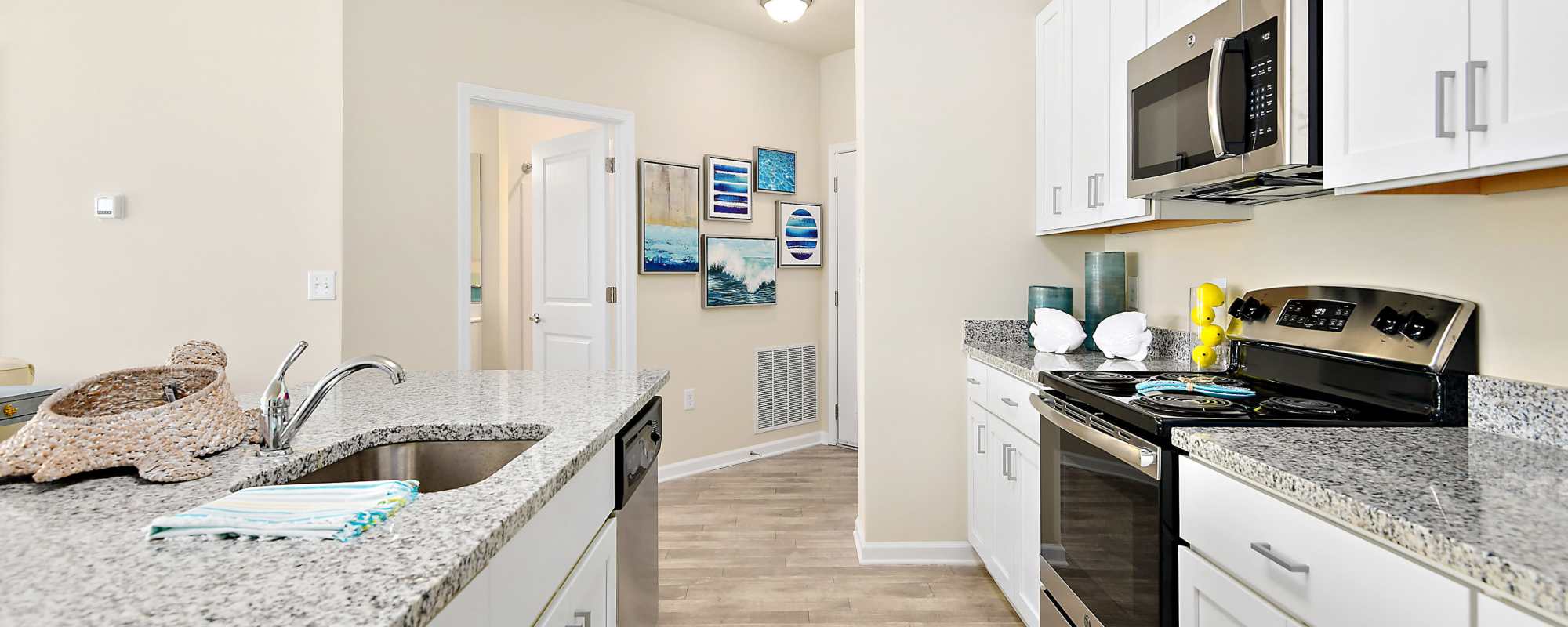 Kitchen with stainless-steel appliances at Oceans East in Berlin, Maryland