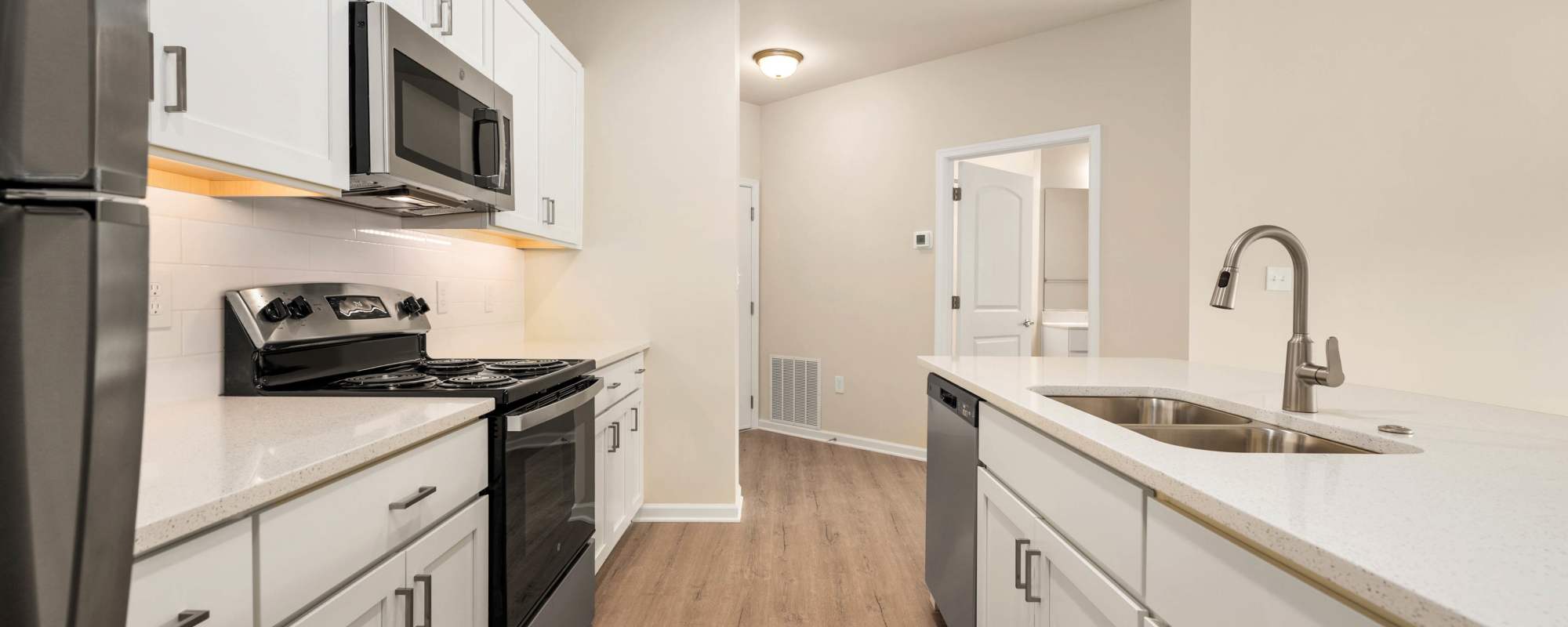 Kitchen with stainless-steel appliances at Ocean Aisle in Salisbury, Maryland