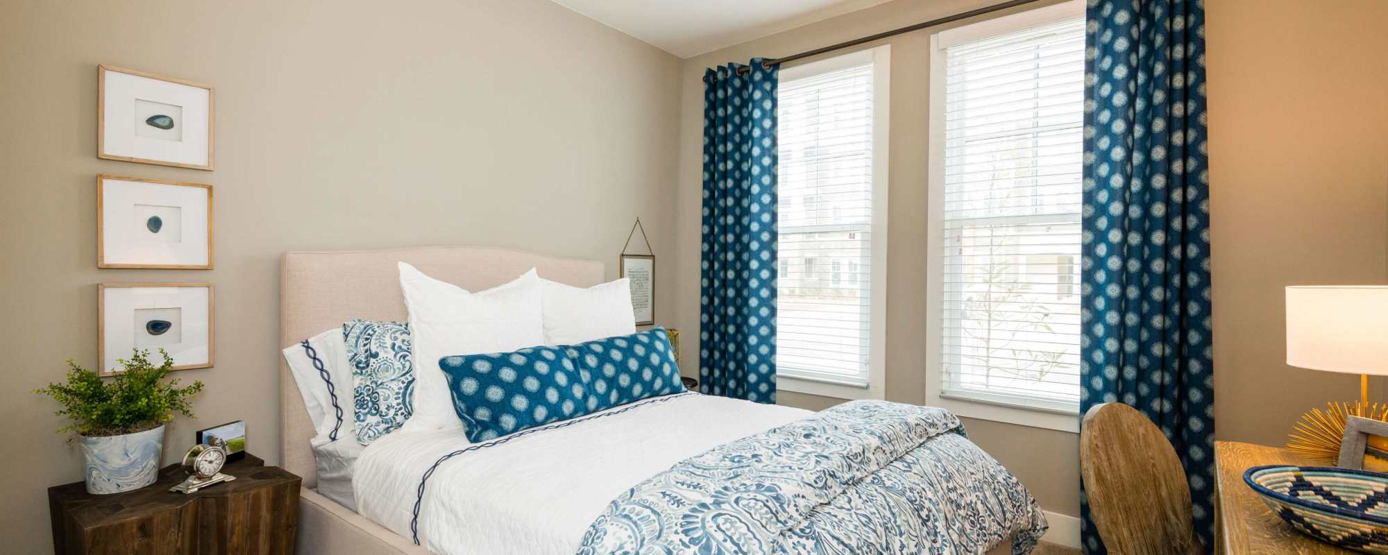 Bedroom with large windows at The Heyward in Charleston, South Carolina