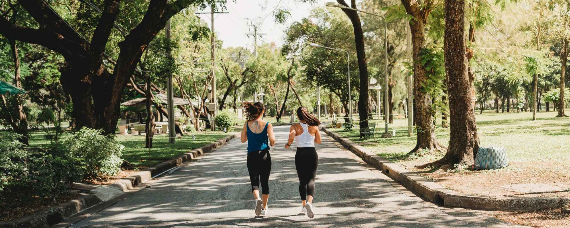 Residents enjoying a jog near Lake House in Los Angeles, California