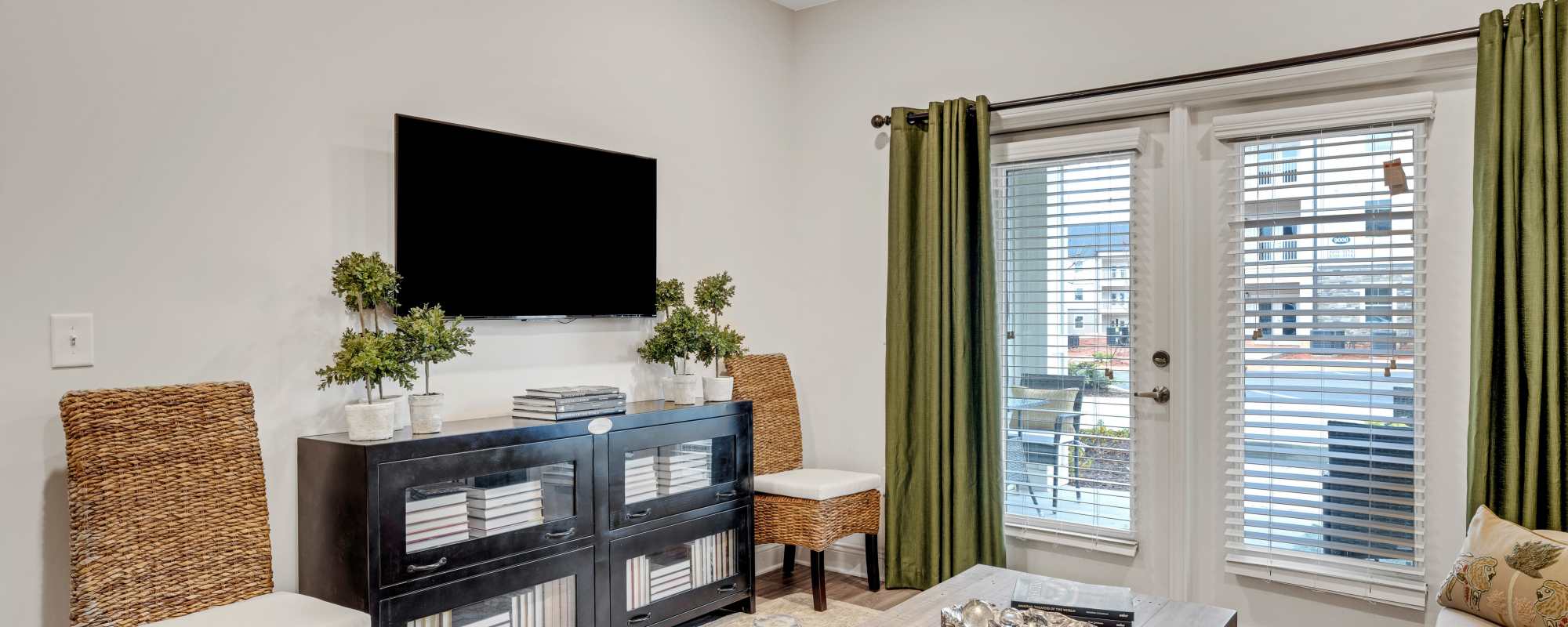 Living room with television at The Standard at Pinestone in Travelers Rest, South Carolina