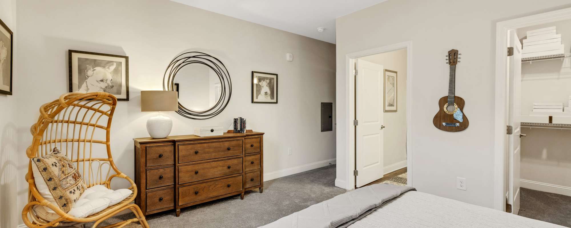 Spacious master bedroom with walk-in closet in a model home at The Standard at Pinestone in Travelers Rest, South Carolina