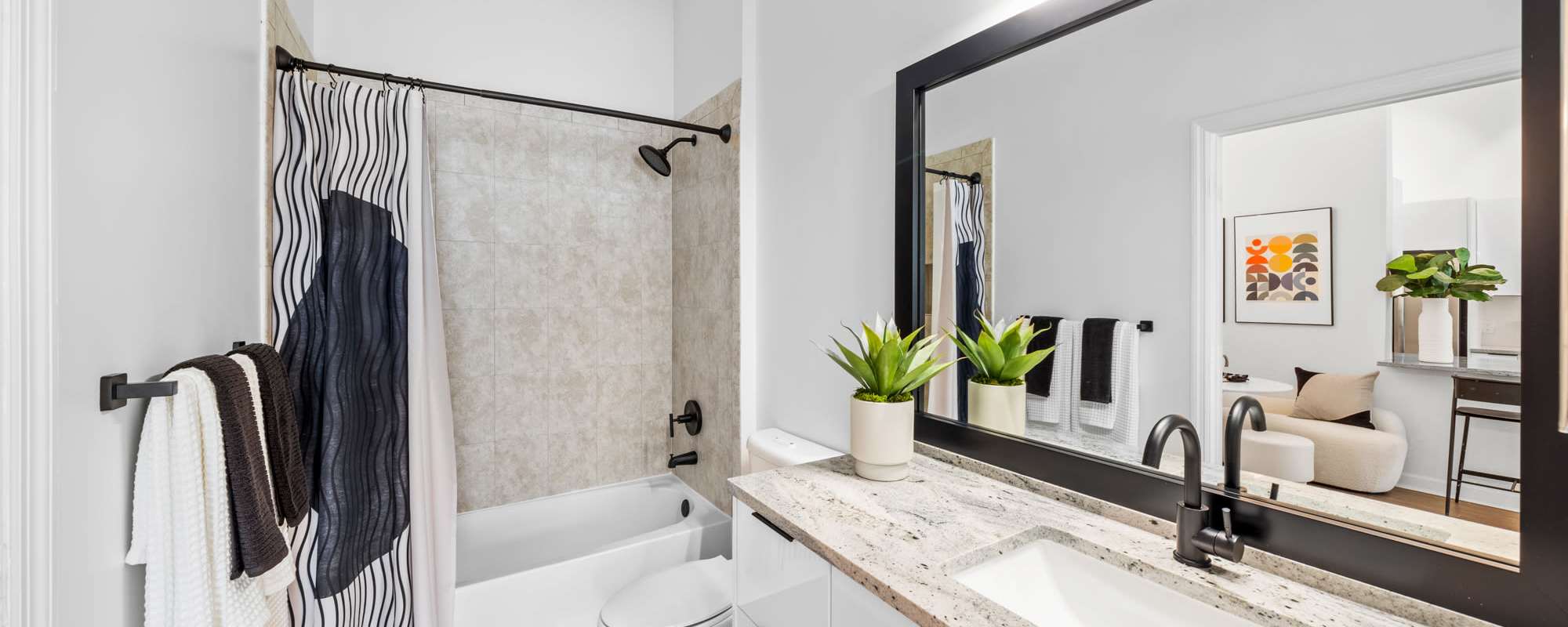 Modern finishes in an apartment bathroom at Cordoba in Doral, Florida